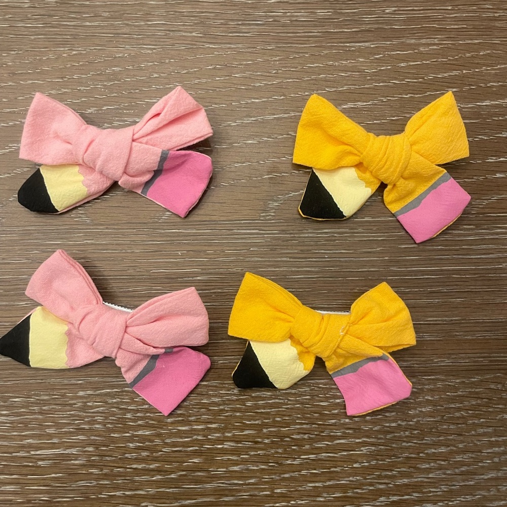 back to school Set of two yellow pencil bows and two pink pencil bows.
